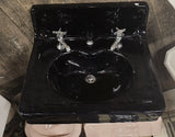 Black Toilets and Sinks from the 1920s to 1990s
